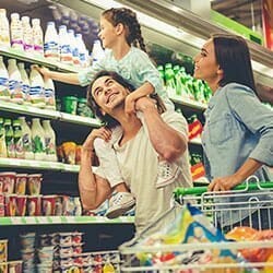 Young Family grocery shopping.